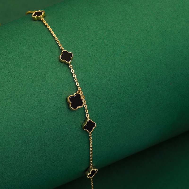 Lắc tay vàng 10K phong cách Ý cỏ 4 lá đá đen - PYLTV10KD0-212011